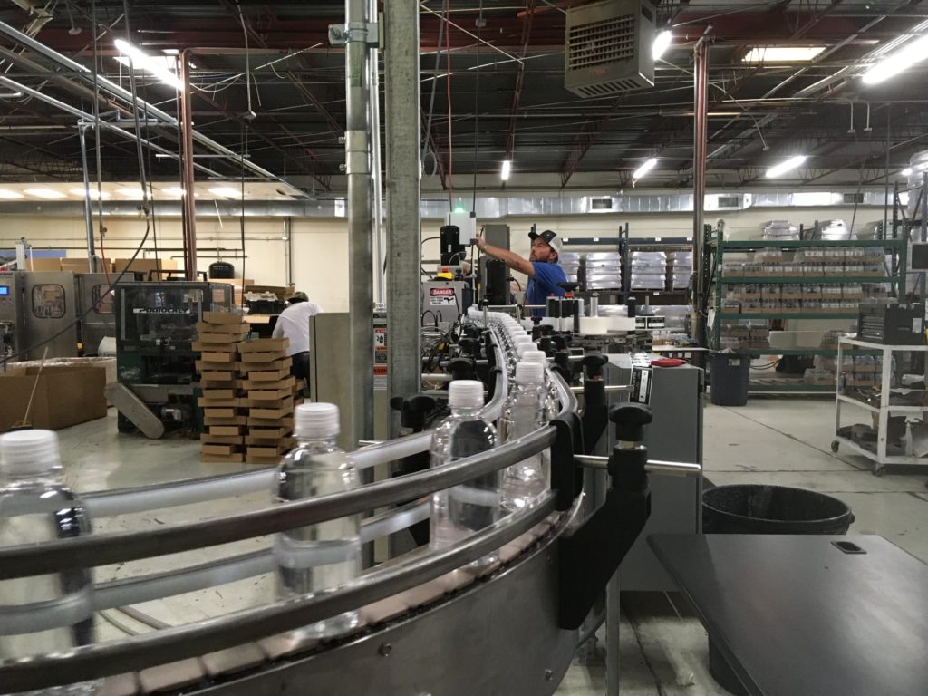 A factory worker at OK Bottling in Tulsa, Oklahoma