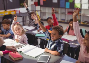 A classroom full of students eager to learn.