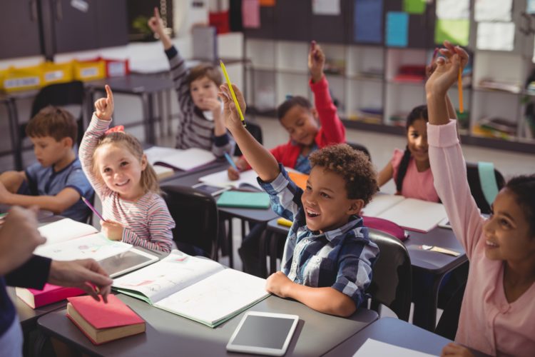 A classroom full of students eager to learn.