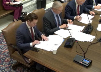 Sen. Adam Pugh (far left) during a Business & Commerce Committee meeting.