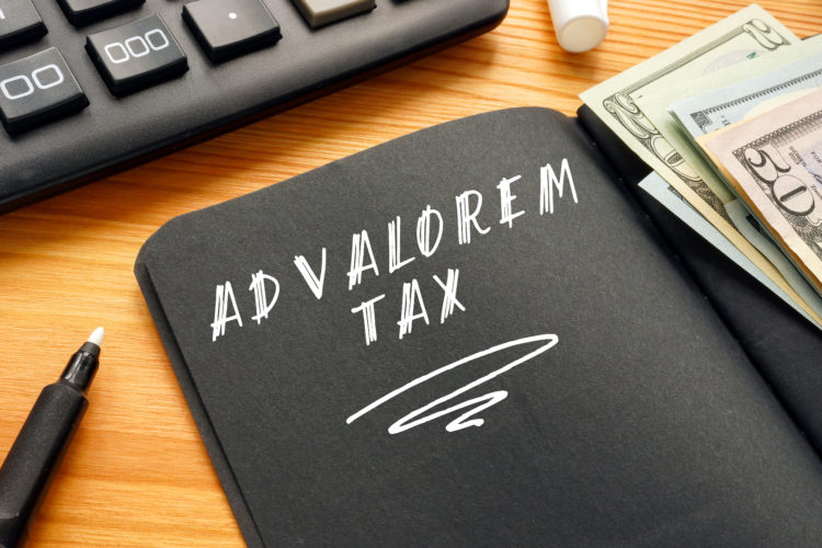 Business concept about AD VALOREM TAX with sign on the page.