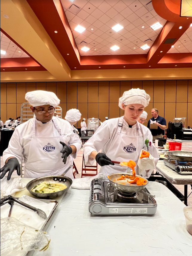 Northeast Technology Center culinary students preparing a three-course meal.