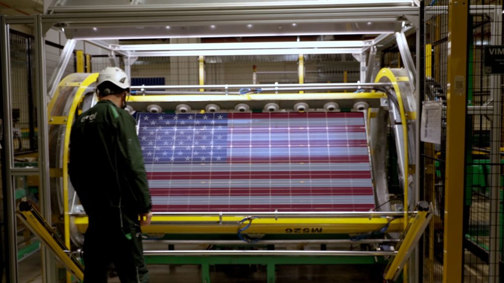 A solar panel with a patriotic theme being manufactured in an Enel facility. Image from Enel.