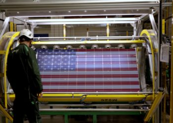 A solar panel with a patriotic theme being manufactured in an Enel facility. Image from Enel.