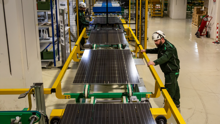 Solar panels being manufactured in an Enel facility. Image from Enel.