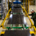 Solar panels being manufactured in an Enel facility. Image from Enel.