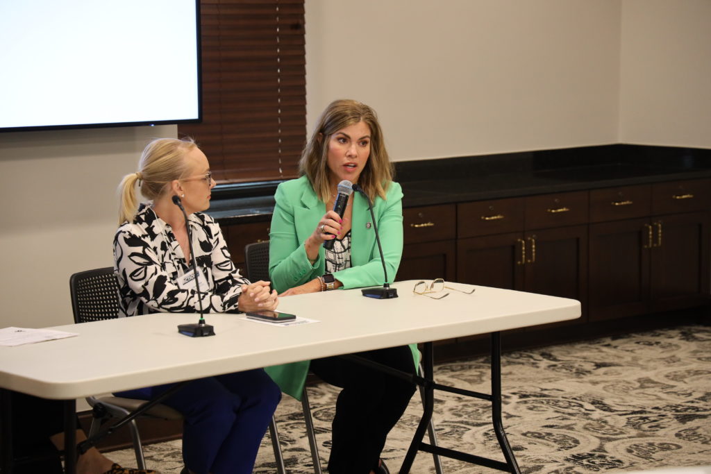 Suzanne Schreiber (right) speaks during an Employers in Action presentation.