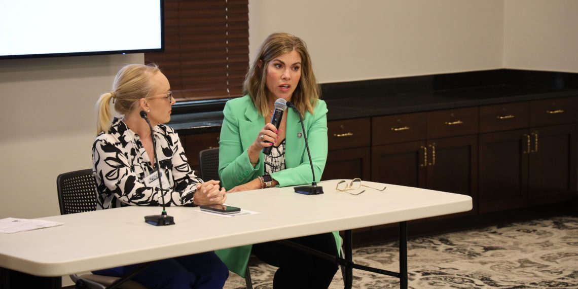 Suzanne Schreiber (right) speaks during an Employers in Action presentation.