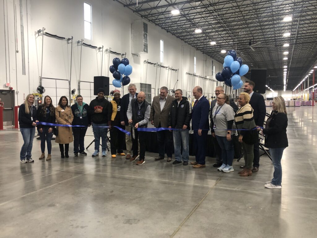 The ribbon being cut on the new Sam's Club distribution center.