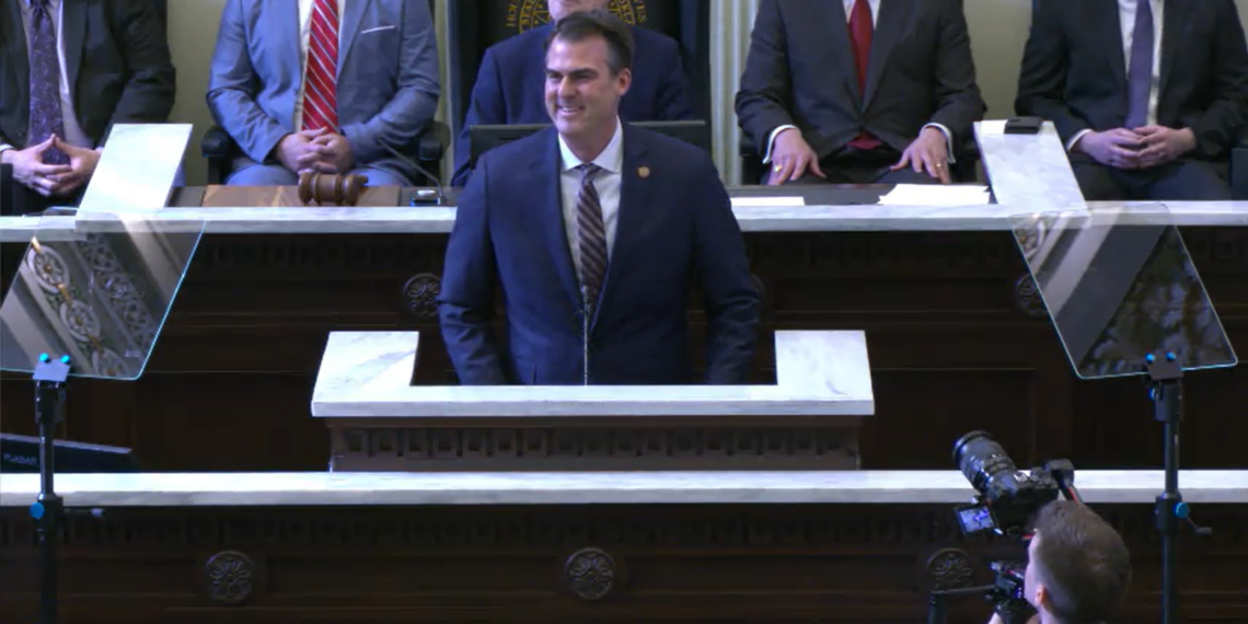 Gov. Kevin Stitt takes the podium to deliver his annual State of the State address.