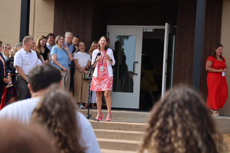 Jennifer Goodrich speaks at the counseling center's ribbon cutting.