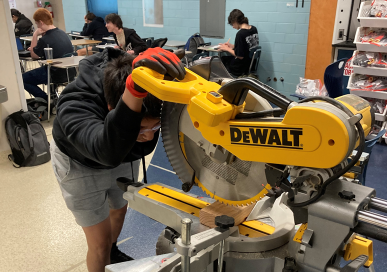 A student focuses on his task in Bartlesville High School's Construction Tech course. Photo from Douglas Boudreaux