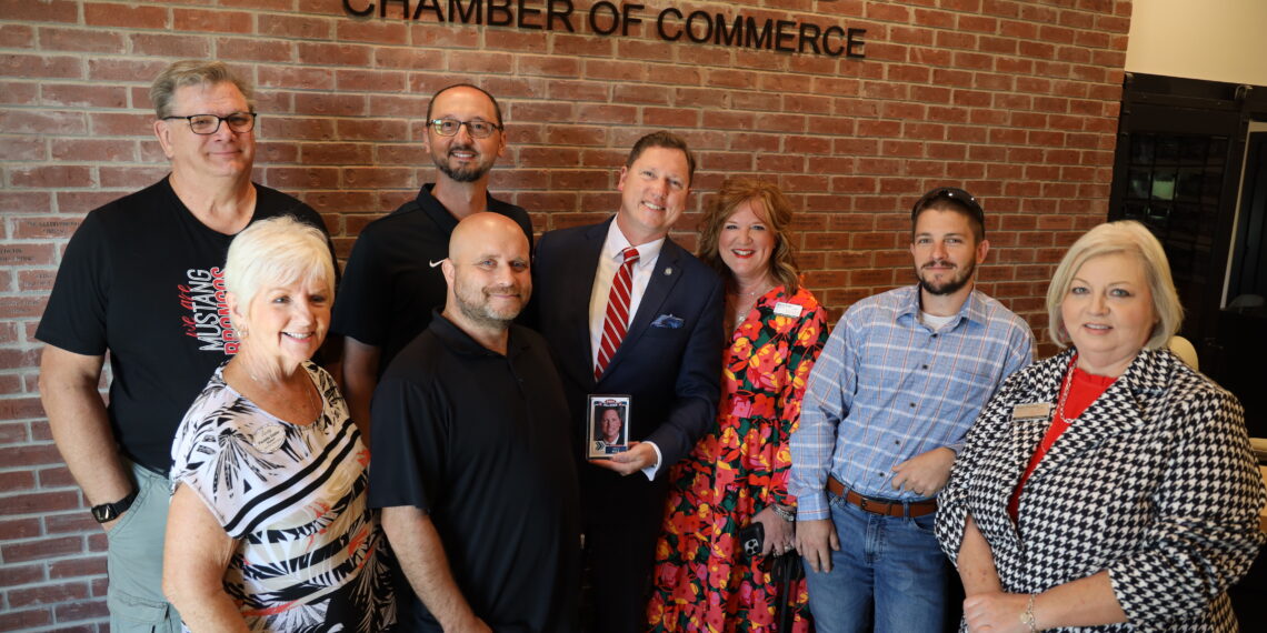 Rep. Brian Hill receiving The State Chamber's Business All-Star Award at the Mustang Chamber of Commerce.