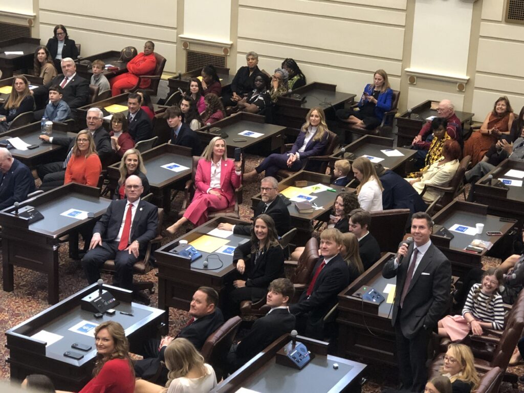 Sen. Adam Pugh (lower right) thanks his family and friends while speaking on the Senate floor.