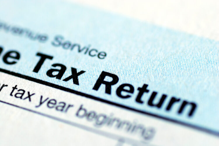 Close up view of the income tax return tax refund