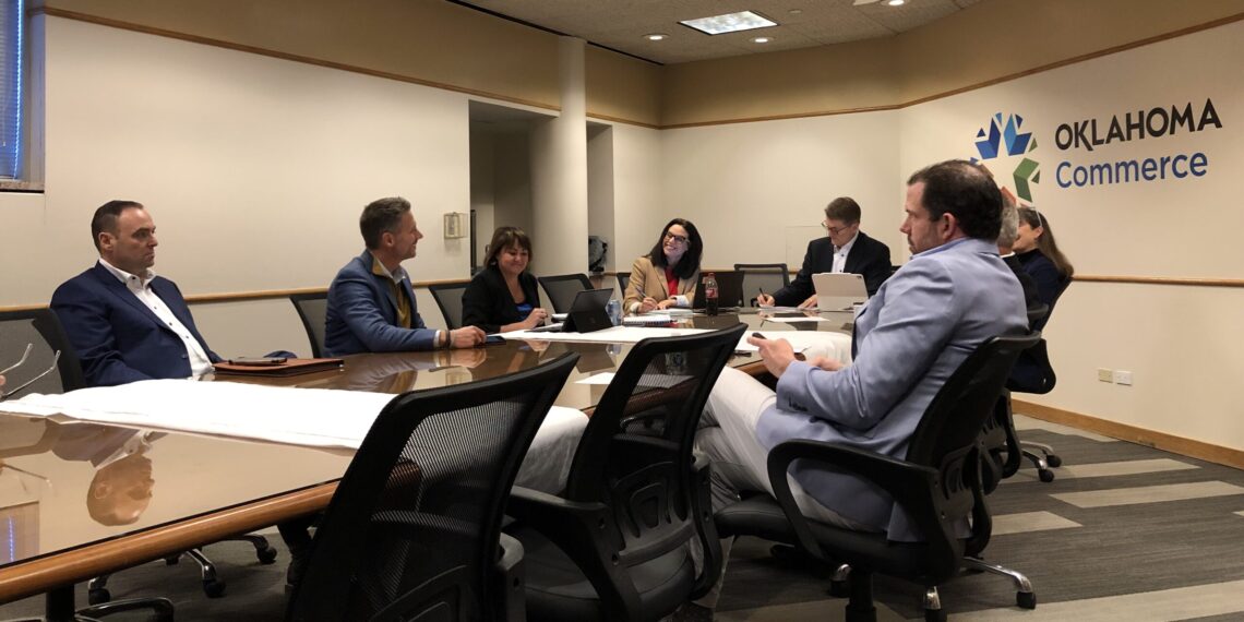 Kyla Guyette (center) speaks during the Oklahoma Workforce Commission.