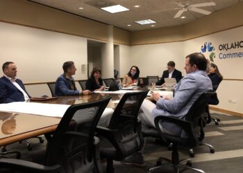 Kyla Guyette (center) speaks during the Oklahoma Workforce Commission.