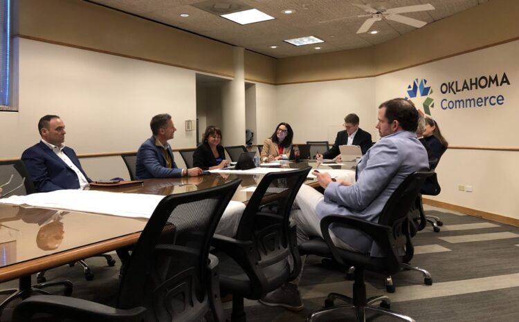 Kyla Guyette (center) speaks during the Oklahoma Workforce Commission.