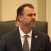 Gov. Stitt’s State of State calls for income tax cut, business focus, announces DOGE-OK