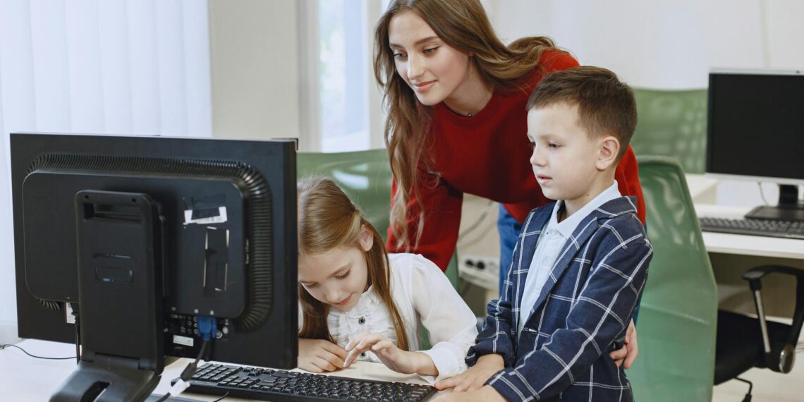 Elementary school students on computer