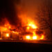 A residence burns as a wildfire outbreak spreads across Stillwater, Oklahoma, highlighting the devastation caused by wildfires to homes and communities in rural areas.
