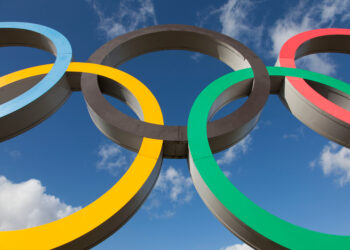 LONDON, UK - February 15th 2018: The Olympic symbol, made up of five interconnected coloured rings, under a blue sky