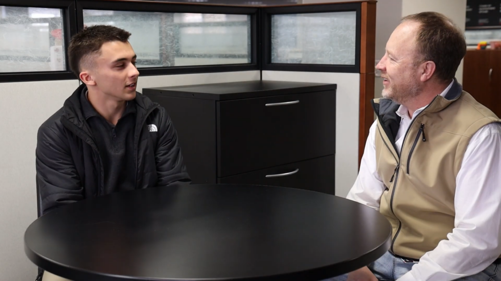 Owen May talking with Scott Bilger.