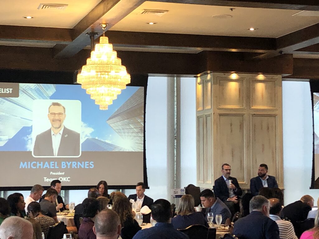 Oklahoma business leaders having lunch and listening to a fireside chat on the Summer Olympics coming to OKC in 2028.