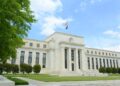 Federal Reserve Holds Interest Rates Steady, Citing Solid Growth and Persistent Inflation